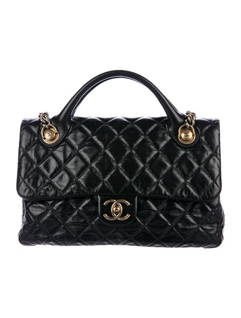 chanel medium castle rock flap bag